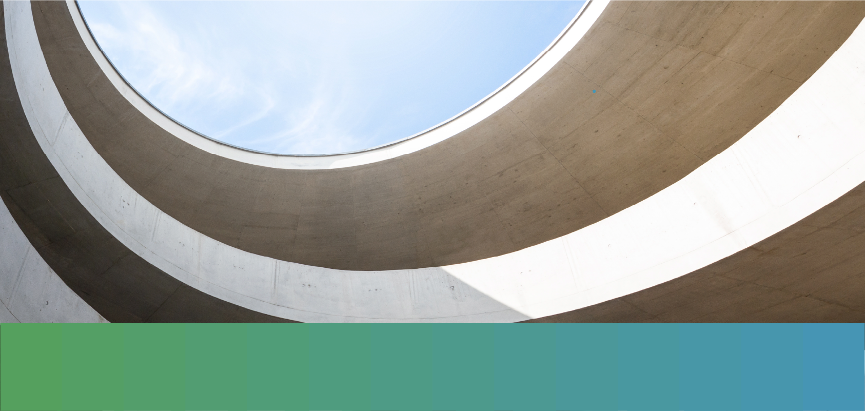 Photo looking up at cement modern architecture